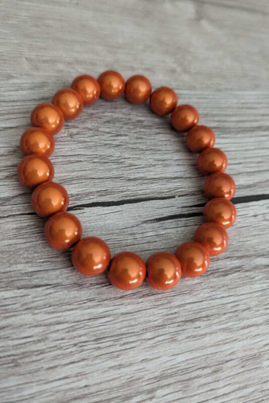 Elastisches Armband, Perlen glänzend - verschiedene Farben - orange 